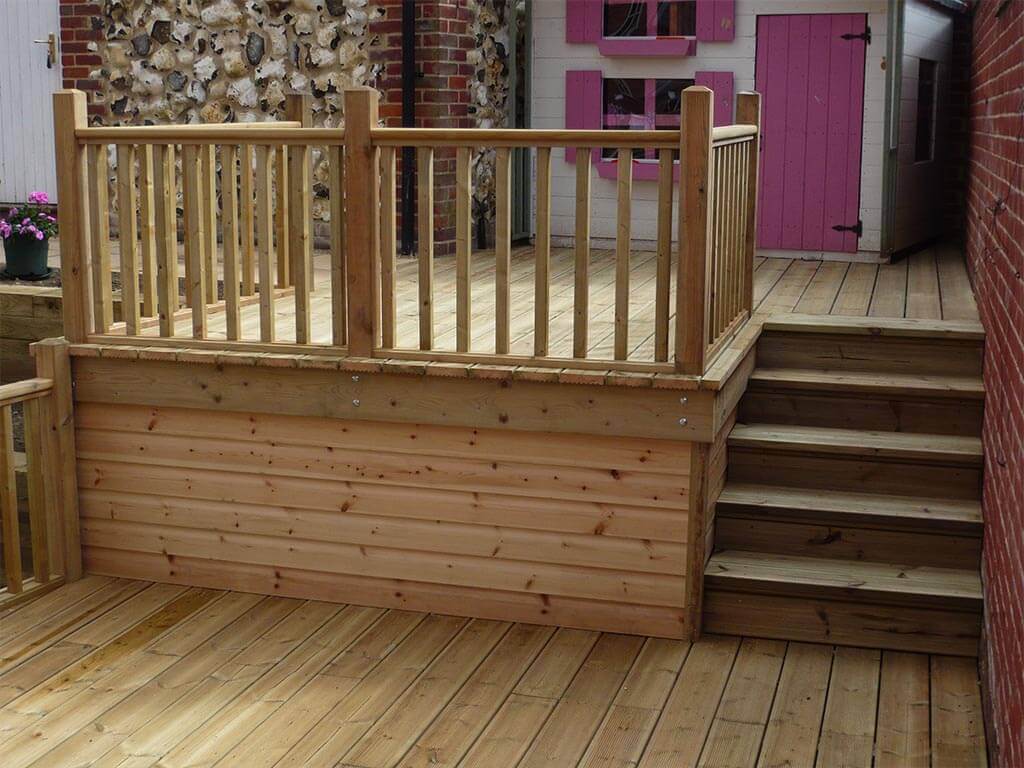 Timber decking installation with steps and handrails